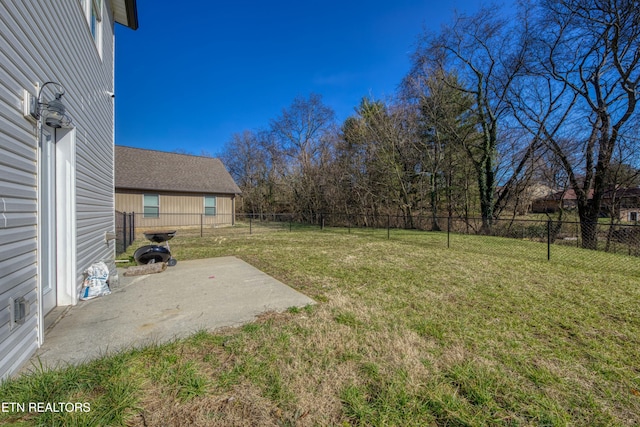 view of yard with a fenced backyard and a patio