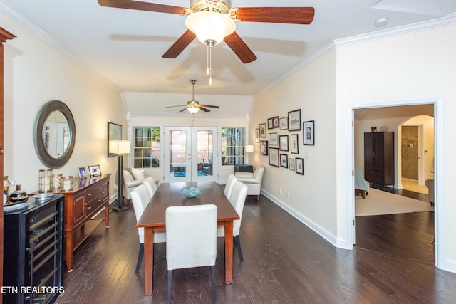 dining area with wine cooler, crown molding, dark hardwood / wood-style flooring, and french doors