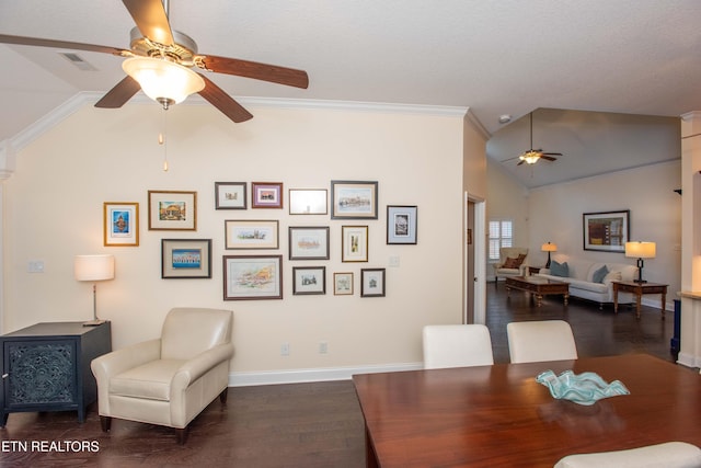 office area featuring vaulted ceiling, ornamental molding, ceiling fan, and dark hardwood / wood-style flooring