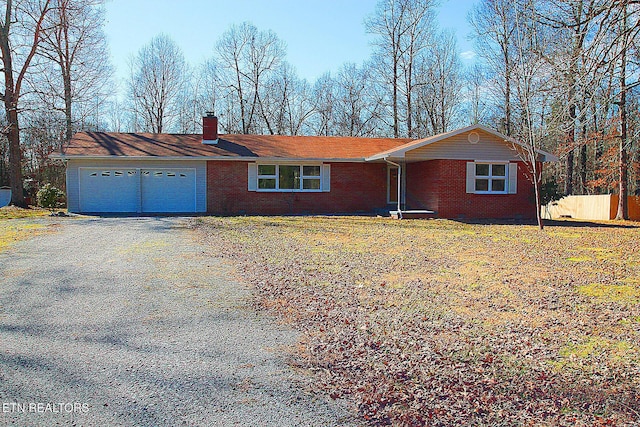 single story home with a garage