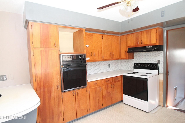 kitchen with ceiling fan, oven, decorative backsplash, and electric range