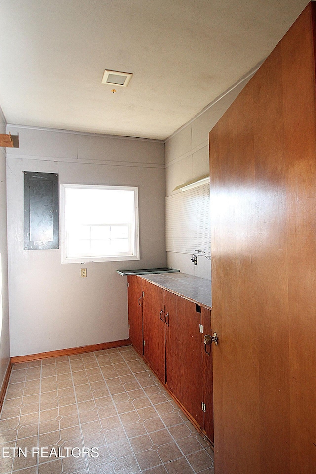 interior space with light tile patterned floors