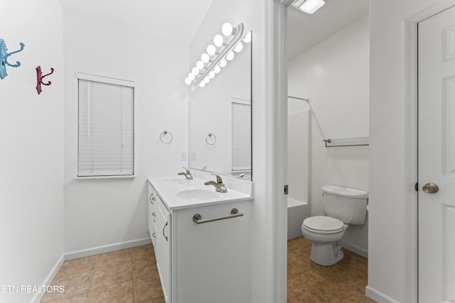 bathroom featuring tile patterned flooring, vanity, a shower, and toilet