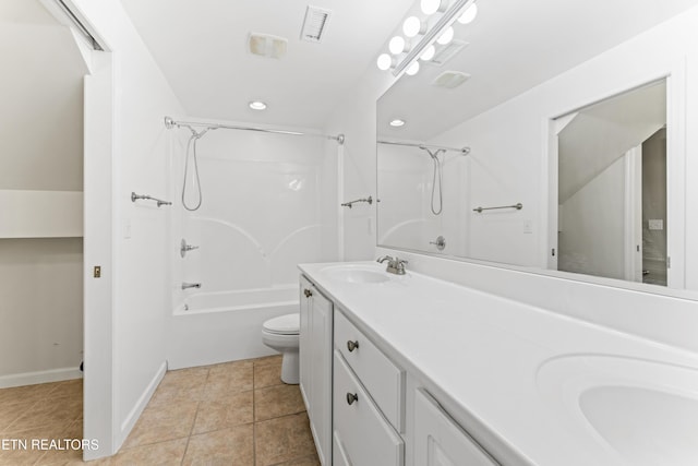 full bathroom featuring vanity, toilet, tile patterned flooring, and shower / bathing tub combination