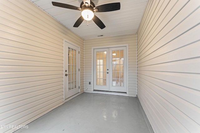 property entrance featuring a patio, ceiling fan, and french doors