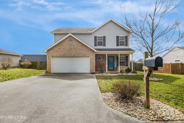 front of property with a garage and a front lawn