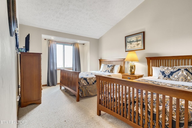 1130 Ski View Dr, Gatlinburg, TN 37738 - bedroom with light carpet, a textured ceiling, lofted ceiling, and baseboards
