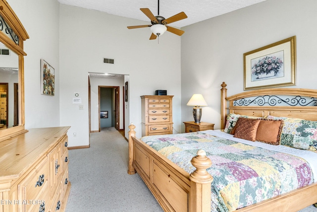 1130 Ski View Dr, Gatlinburg, TN 37738 - bedroom with light carpet, visible vents, baseboards, and a textured ceiling
