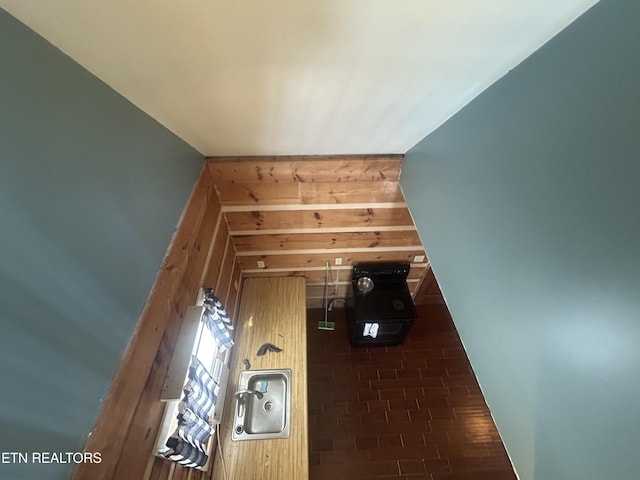 interior space featuring wooden walls