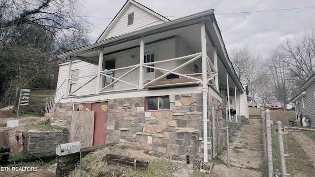 view of front of property with a balcony