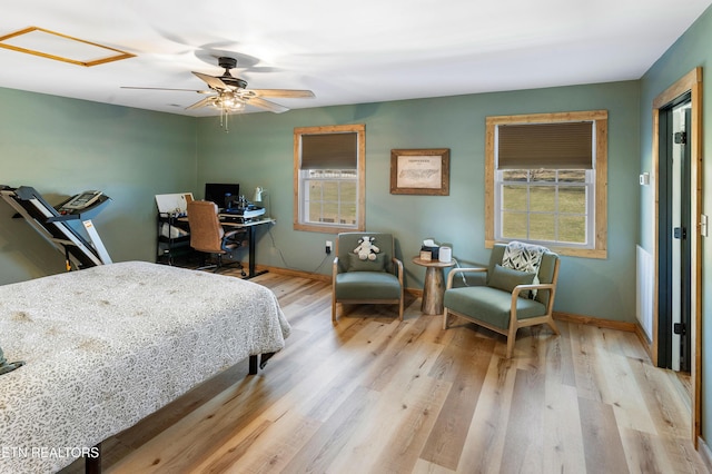 bedroom featuring ceiling fan and light wood-type flooring