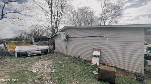 view of home's exterior with ac unit