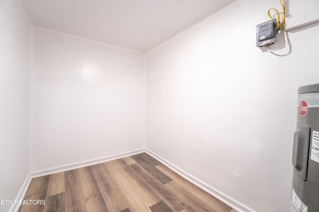 interior space featuring hardwood / wood-style flooring and water heater