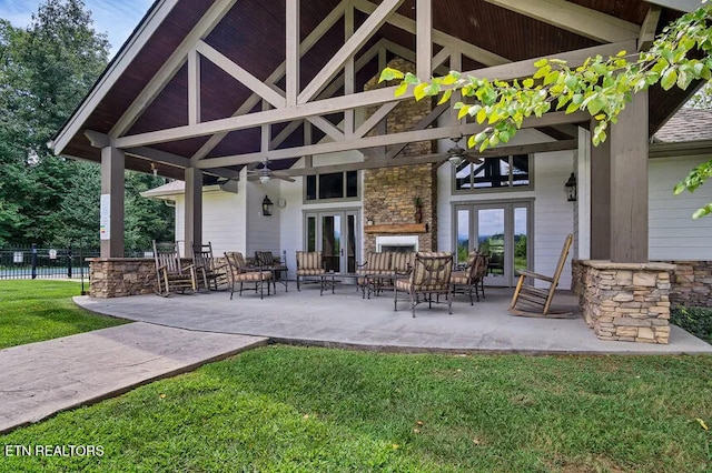 view of patio / terrace with french doors and ceiling fan