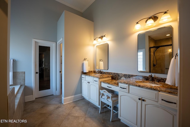 bathroom featuring tile patterned flooring, vanity, separate shower and tub, and crown molding