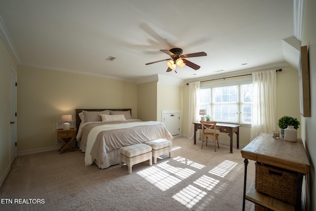 bedroom with crown molding, light colored carpet, and ceiling fan