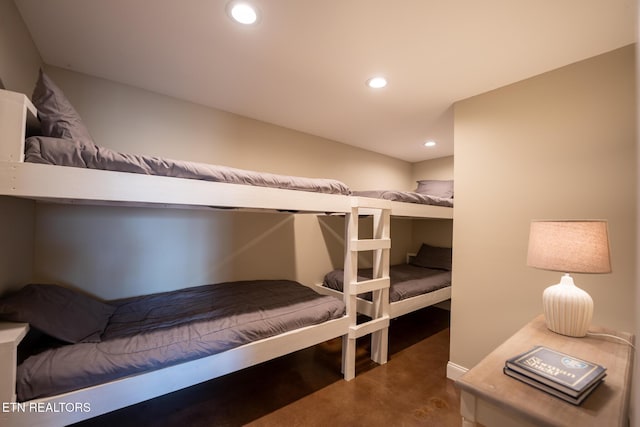 bedroom with concrete floors