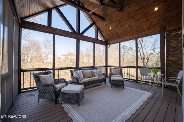 sunroom / solarium featuring ceiling fan, lofted ceiling, and wooden ceiling