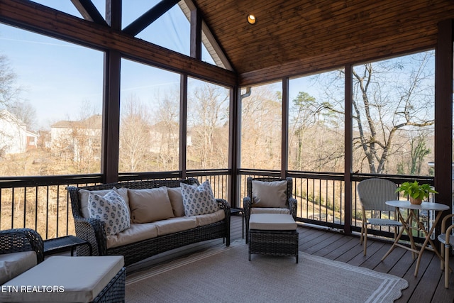 sunroom with lofted ceiling