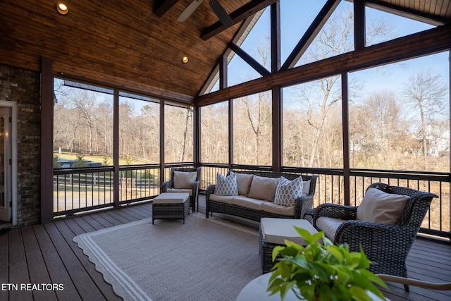 unfurnished sunroom featuring vaulted ceiling and wooden ceiling