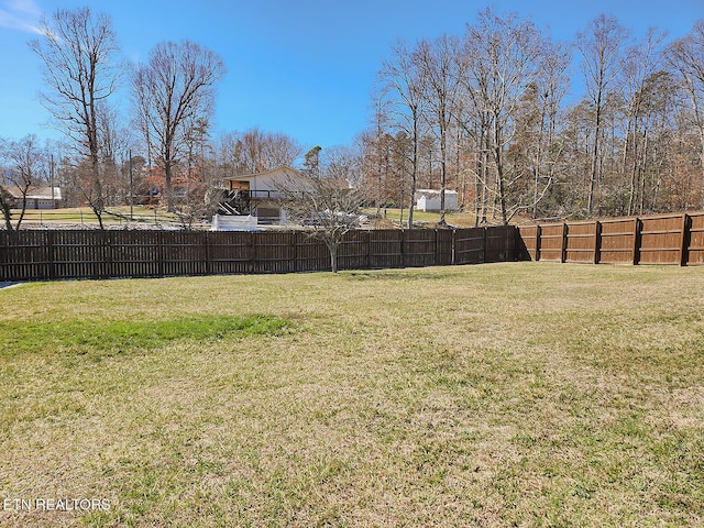 view of yard with fence