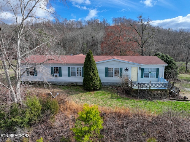 view of front of home with a wooden deck