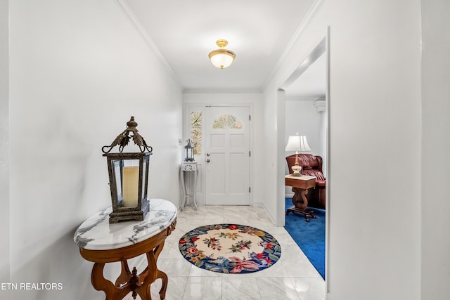 foyer entrance featuring crown molding