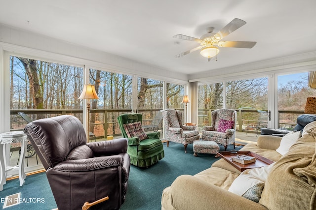 sunroom / solarium with ceiling fan