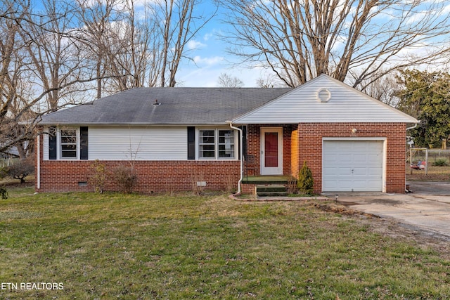 ranch-style house featuring crawl space, an attached garage, a front lawn, and brick siding