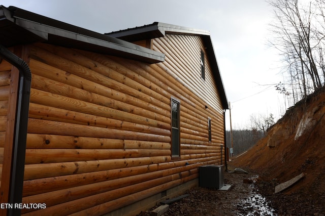 view of property exterior featuring central AC unit