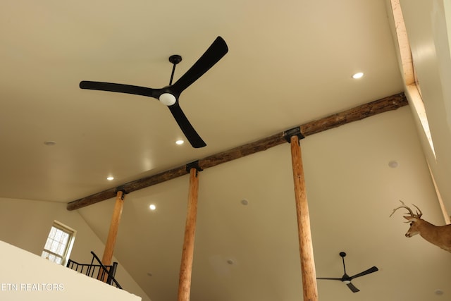 details featuring ceiling fan and beam ceiling