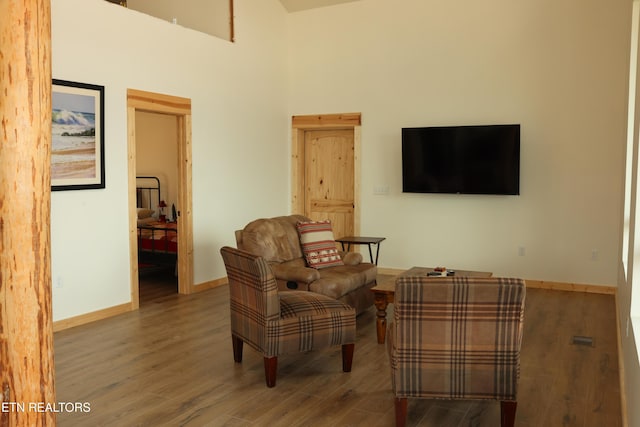 sitting room featuring wood-type flooring