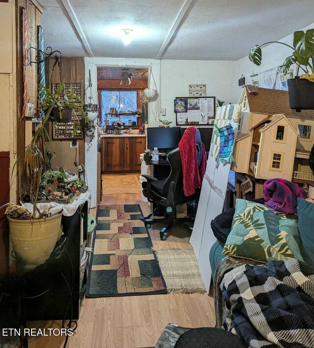 office area featuring wood finished floors