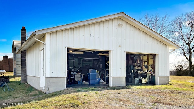 garage with a lawn