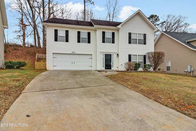 view of front facade featuring a garage and a front yard