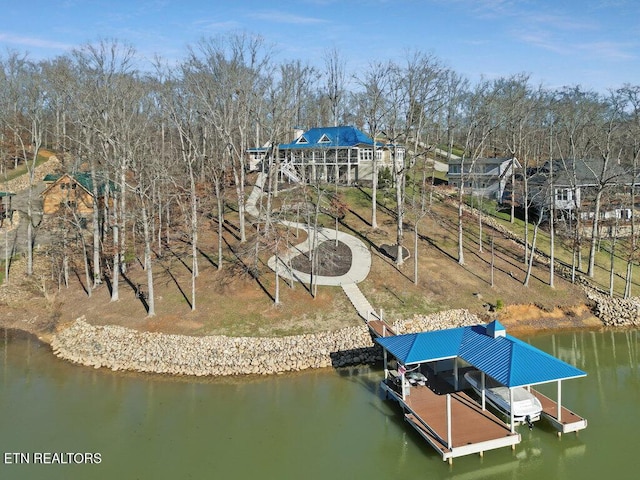 view of dock featuring a water view and boat lift