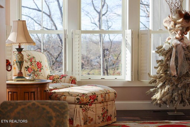 sitting room featuring baseboards