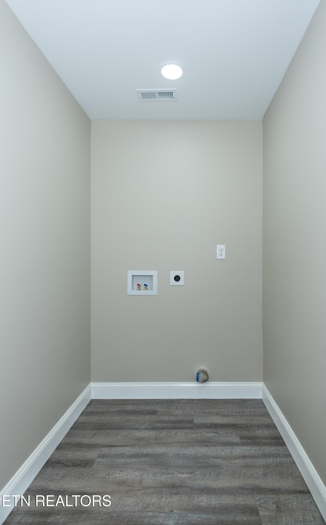 laundry room featuring dark hardwood / wood-style flooring, hookup for a washing machine, and electric dryer hookup