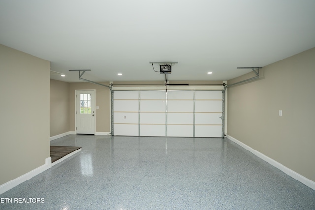 garage featuring a garage door opener