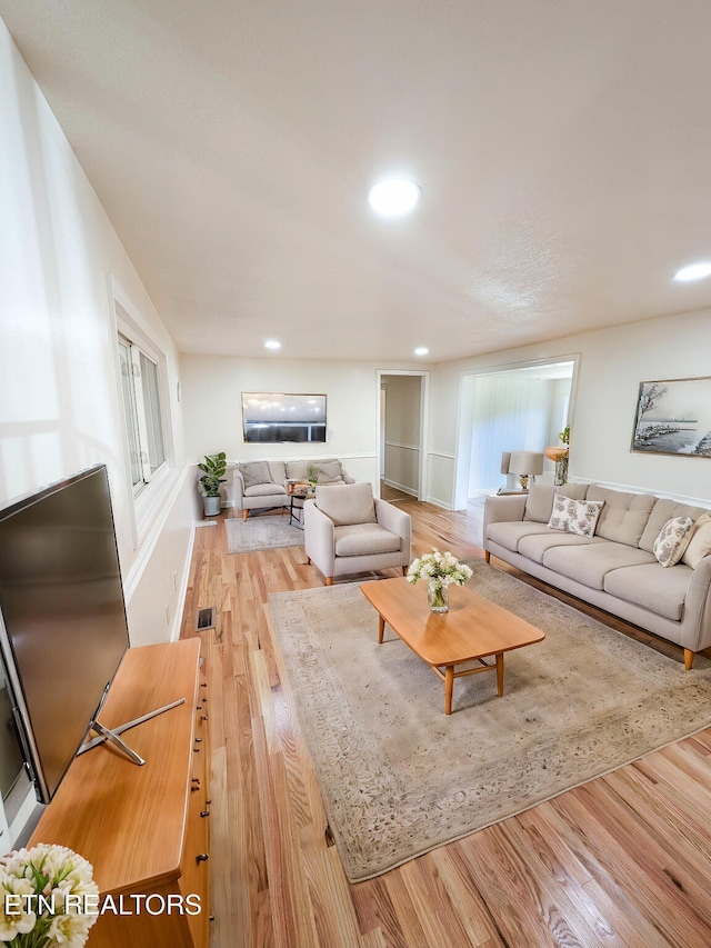 living room with light wood-type flooring