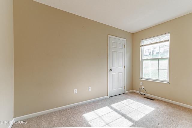 view of carpeted spare room