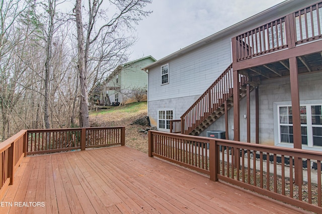 wooden deck with central AC unit