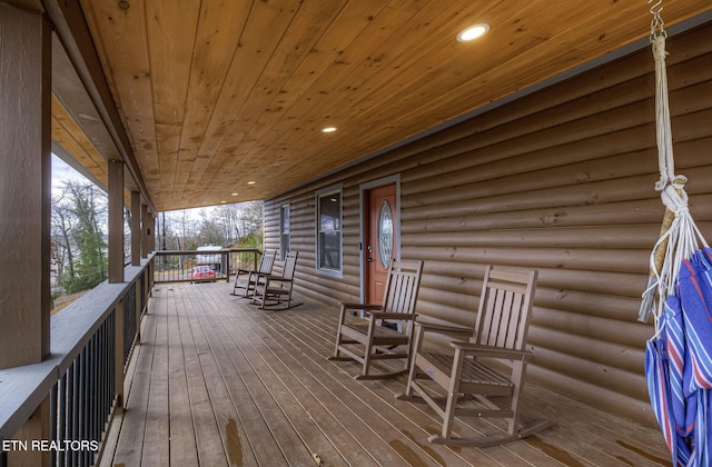 wooden deck with a porch