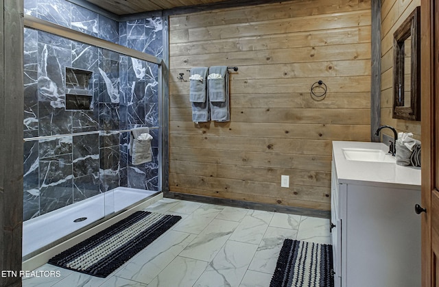 bathroom featuring vanity, an enclosed shower, and wood walls