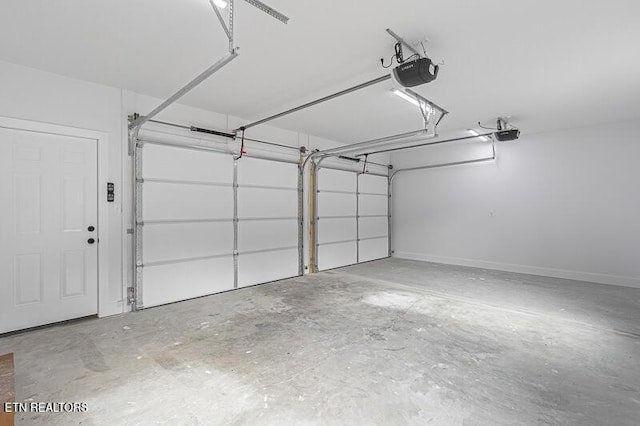 garage featuring a garage door opener