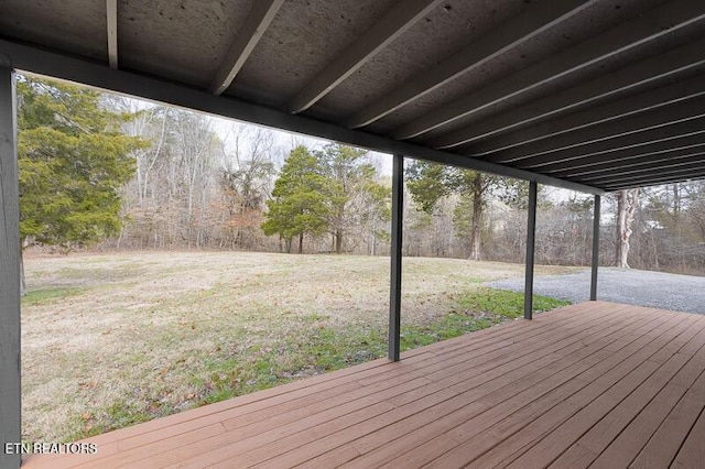 deck featuring a lawn