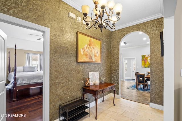 hallway featuring ornamental molding, tile patterned flooring, and a notable chandelier