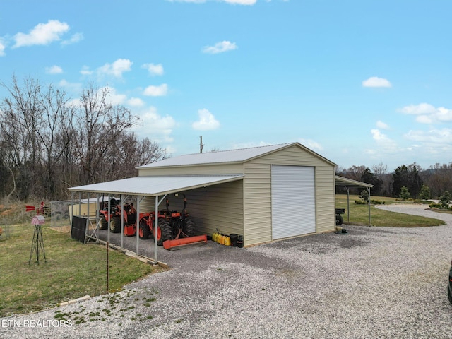 exterior space featuring a detached garage