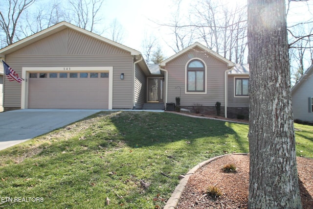 ranch-style house with driveway, an attached garage, and a front yard