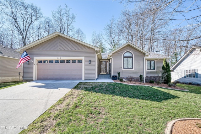 ranch-style house featuring a front yard, concrete driveway, and an attached garage